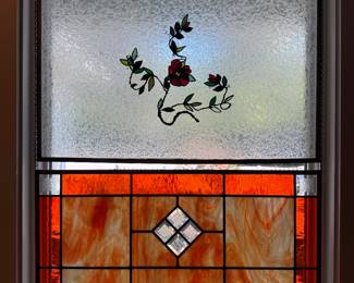 Orange stained glass window, opaque window, stained glass floral
Sculpture