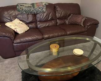 Leather couch and glass coffee table