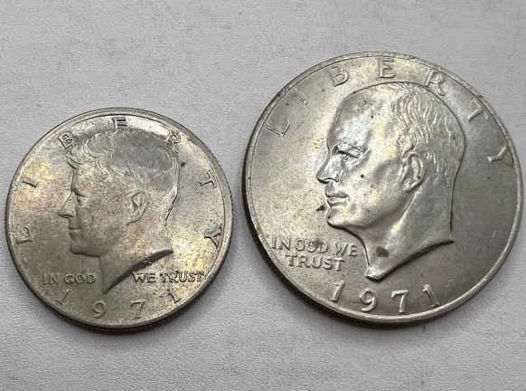 (2) 1971 Coins ft. Eisenhower Dollar Coin & Kennedy Half

