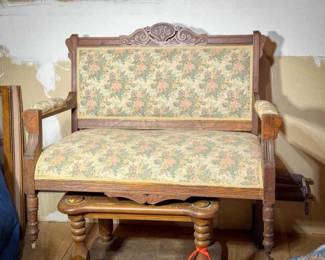 Antique Carved Settee with Floral Upholstery
