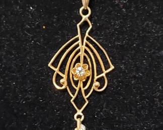 10k gold pendant with diamond and pearl