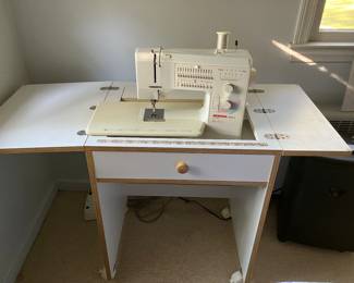 Bernina sewing machine and cabinet