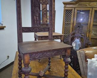 With carved oak Nobleman and Noblewoman motif chairs 