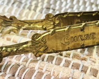 Much St. Joseph, MO collectibles. "Chase" Candy Co. chocolate tongs