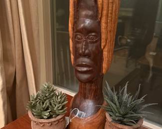 Hand carved tribal statue