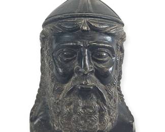 This is a magnificent and exceedingly rare artifact, a hand-carved marble head of the Greek god Poseidon, dating to the ancient Greek period. The artist has demonstrated exceptional skill in rendering the god's powerful countenance, with a long, flowing beard and a distinct cap, capturing his authority and mystique as the god of the sea. The fine details of the carving speak to the masterful artistry of a bygone era. This is not merely a decorative object, but a profound piece of history and mythology, with a commanding presence that will be the centerpiece of any serious collection of antiquities.
