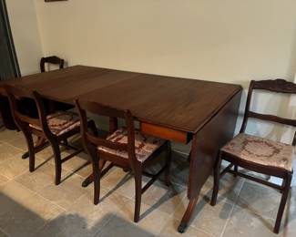 Antique drop-leaf table with four leaves (chairs separate)