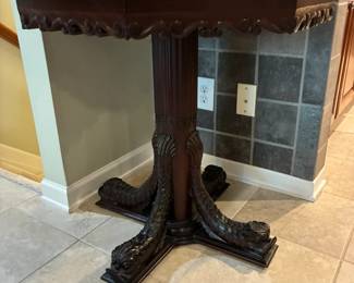 Antique dolphin legged table