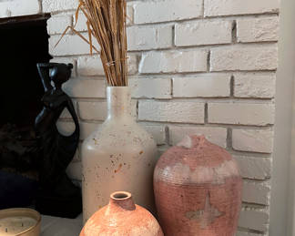 Vases, Candles, Sconces, and Sculptures in every corner of this architect and artist home