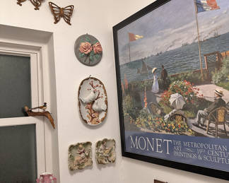 Girly Bath with collectible pieces and artwork. Also wall pockets, sconces and 3D art pieces