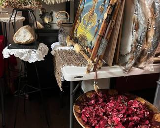Several sizes and types of dream catchers and other Native design art work.