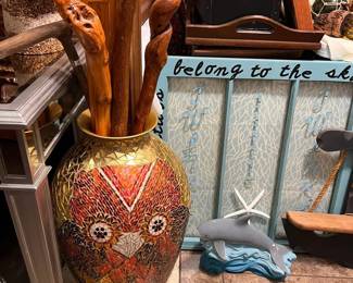 This VASE is beautiful and filled with a great selection of wood canes.