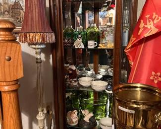 Lighted curio cabinet is for sale along with all the beautiful glass art on each shelf.