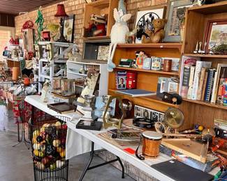 Every table is filled with great finds.  Somewhere on this table is a set of drumsticks from Rush Neil Peart Tour