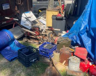 Gas cans, ladders,  antique copperbell