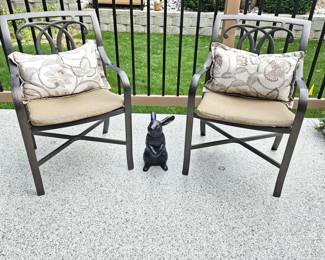 Patio Furniture - Set of Two Beautiful Metal Armchairs with Seat Cushions Paired with A Decorative Black Jack Rabbit