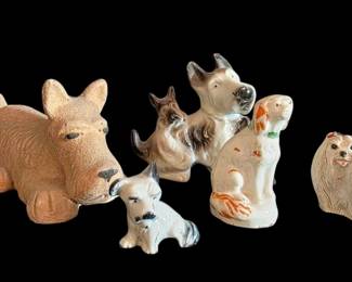 Five Ceramic And Resin Dog Figurines