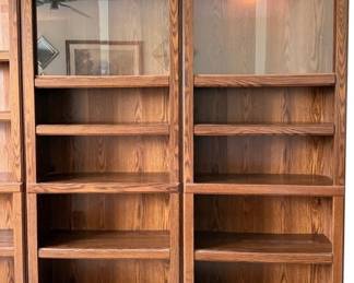Two Bookcases With Sliding Glass 1 Lights Up