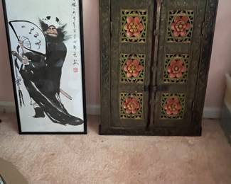 Signed art and carved wall decor
