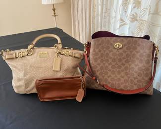 Coach handbags/purses.