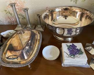 Nice selection of vintage silverplate, including serving pieces, candlesticks, and more.