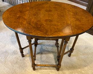 Vintage Baker Furniture petite burled walnut drop-leaf gateleg table.