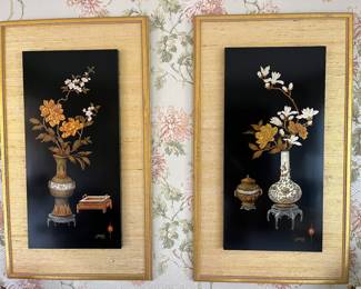 Pair of Chinese-inspired lacquer wall plaques by early 20th-century Grand Rapids furniture artist David Hazy. Hand-decorated in raised gold and silver leaf on mahogany.