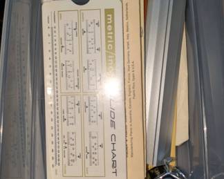 Vintage measuring charts, slide rules etc