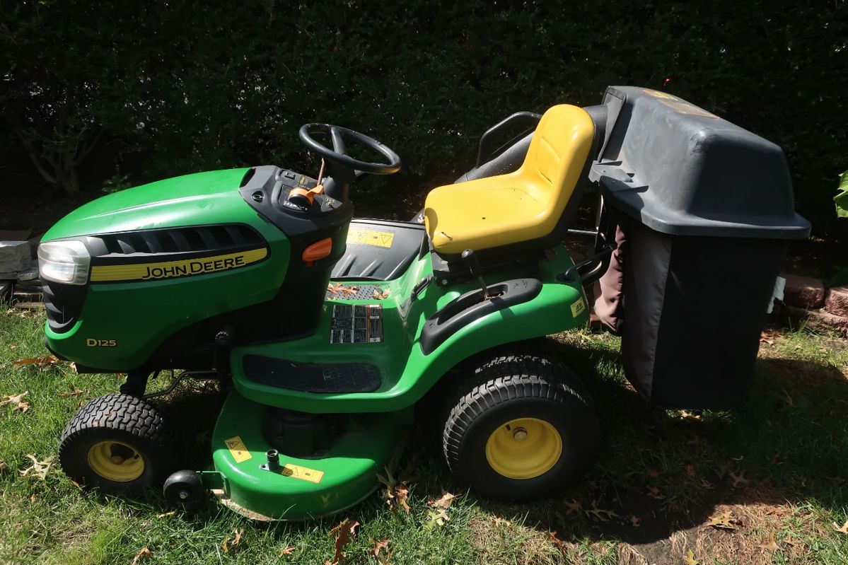 16.  the price 995.00   John Deere d-125, the mower, also included is the bagger attachment, it looks and runs like new