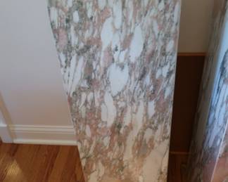 3.  the smaller is 175.00, the taller is 195.00  marble  pedestals    One  is   36"  tall.  The  other  is  43".