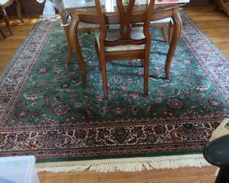 Karastan   green wool  rug.  Size  is   8'2"  x  10'.  Also  another view  of  dining  room  table.