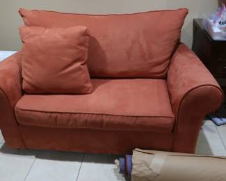 20.      Price  is  $90.00  each    1 of 2 matching   red sofa beds.  They  are  twin  size.