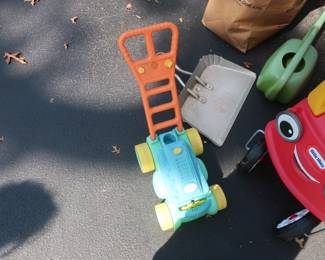other toy and watering can
