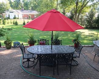 7.  the price is 1500.00  Hanamint patio set, 6 regular chairs, 2 swivel chairs  Size  is  41"  x  84".