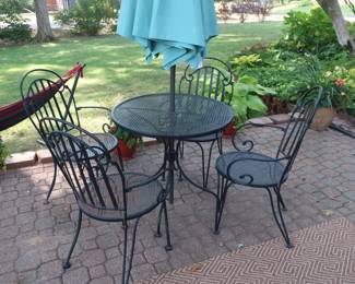 14.  the price is 195.00   30" round patio table, umbrella and 4 chairs