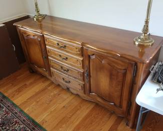 13.  the price is 495.00  Ethan  Allen  buffet.  Size  is  67"  x  19".