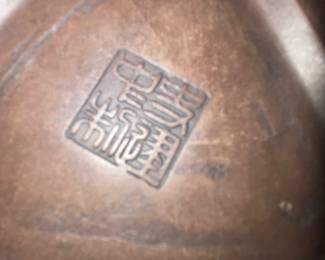 bottom of P and D pottery vase