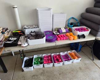 Lots of work out equipment weights, mats