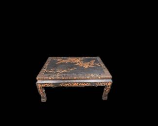 Vintage Asian black lacquer wood coffee table w/ handpainted gold & coral floral & vine motifs, carved legs & overall crackle paint finish, 25"x17.5"x38"