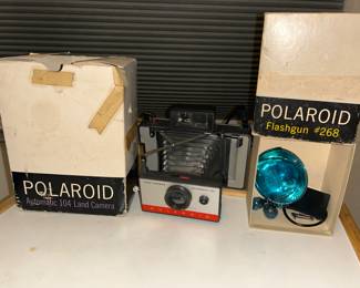 1966 Polaroid camera with flash attachment