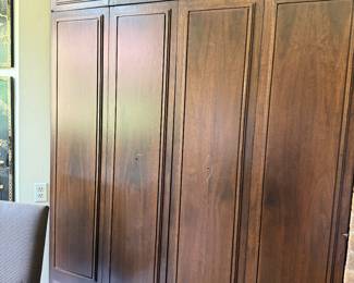The bifold door, solid walnut at the sunken den bar