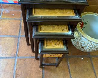 Another set of stacking tables ornately carved