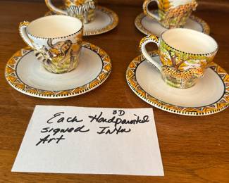 Intu signed art hand painted cup and saucers