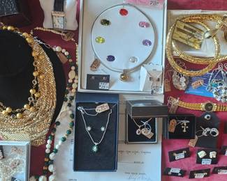 Some gold and sterling jewelry.  Diamond, emerald and ruby gold jewelry with appraisals.  