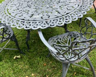 Large wrought table w/ 4 chairs