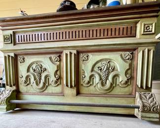 Green bar with Granite top. It has open shelving in the back