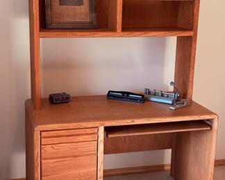 Did I mention we have TWO of these? Abraham Lincoln, if he was still with us, would approve, but meanwhile his visage on the top shelf serves to imbue this magnificent piece with its vintage charm. Hole punches, staplers and tons of office supplies are waiting to go home in these oaken drawers...
