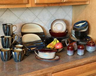 Daily dishware, excellent condition, includes mugs, salad plates, bowls, dinner plates , gravy boat, salt and pepper shaker, sugar bowl and serving bowls. I'll have eaten the bananas by the time you get here.