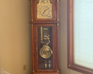 Add a little ‘Be Our Guest’ magic to your home with this timeless Ridgeway grandfather clock! Mint condition. As stately as Cogsworth and as classic as a castle ballroom, it chimes with elegance and keeps time as faithfully as any enchanted friend. If you need Lumiere, there's more than enough brass lamps here to fill the role...