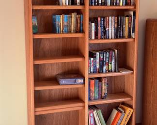 I'm not sure why there are so many bookcases. Don't get me wrong... There's a ton of hardback mystery and thriller novels (Patricia Cornwell, John Grisham, Robert Ludlum, Clive Cussler, Brad Thor, Lee Child, David Baldacci among many others... A couple of hardback Harry Potter books as well). So many books, but more bookshelf space than your local library... If you need shelf storage, I've got you covered.